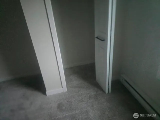 a view of a room with an empty space