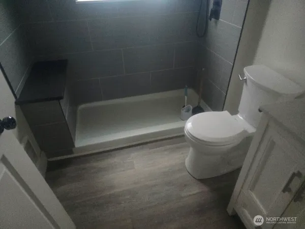 a bathroom with a sink and toilet
