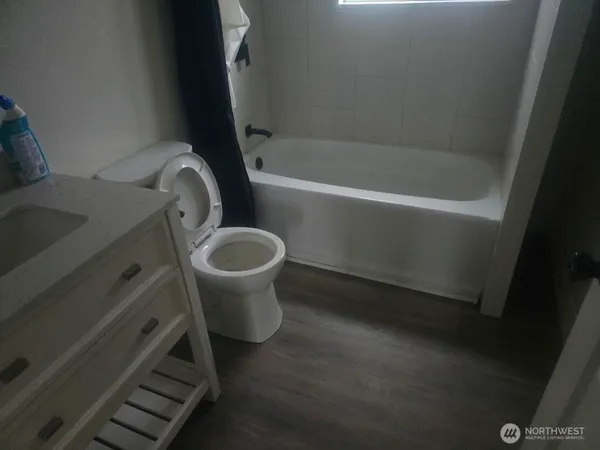 a bathroom with a sink and a toilet