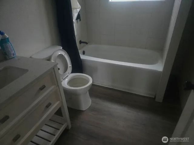 a bathroom with a sink and a toilet