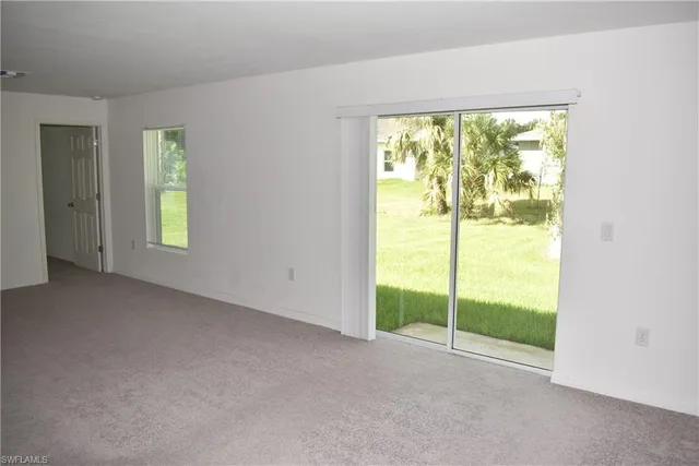 a view of an empty room with window