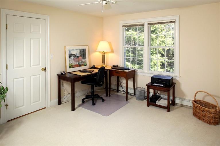 50 Woods Neck Road Orleans, MA 02653 - Photo 12 of 22 a view of a workspace with furniture and a window