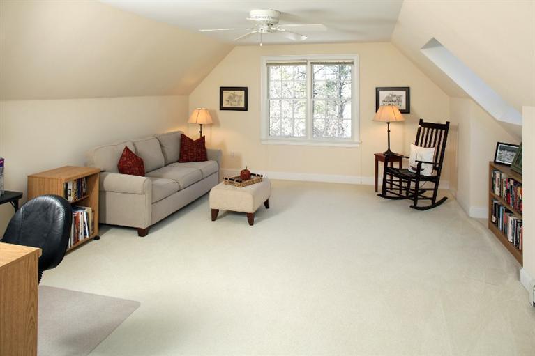 50 Woods Neck Road Orleans, MA 02653 - Photo 13 of 22 a living room with furniture and a window