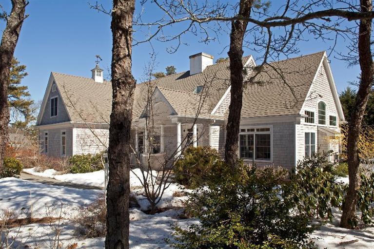 50 Woods Neck Road Orleans, MA 02653 - Photo 16 of 22 a front view of a house with a yard