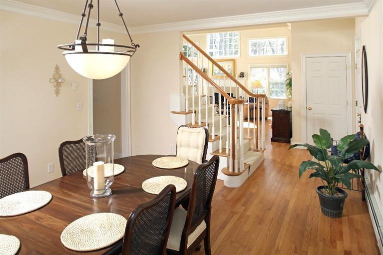 50 Woods Neck Road Orleans, MA 02653 - Photo 6 of 22 a dining room with furniture and wooden floor