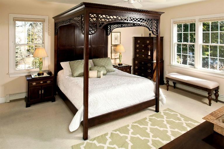 50 Woods Neck Road Orleans, MA 02653 - Photo 7 of 22 a spacious bedroom with a bed and a window