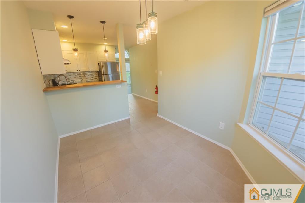 380 Draco Road Piscataway, NJ 08854 - Photo 11 of 35 a view of a kitchen with a sink