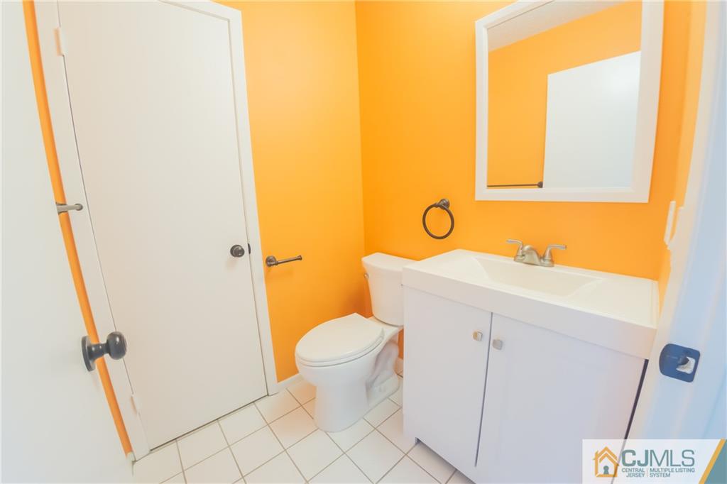380 Draco Road Piscataway, NJ 08854 - Photo 13 of 35 a bathroom with a sink and a toilet