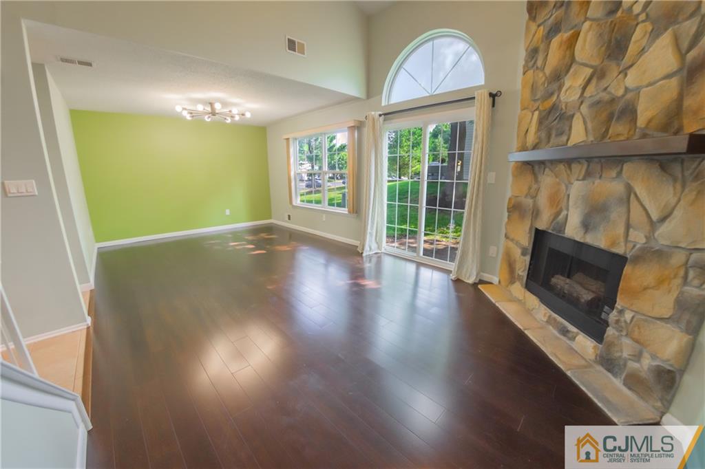 380 Draco Road Piscataway, NJ 08854 - Photo 14 of 35 a view of livingroom with furniture and a fireplace