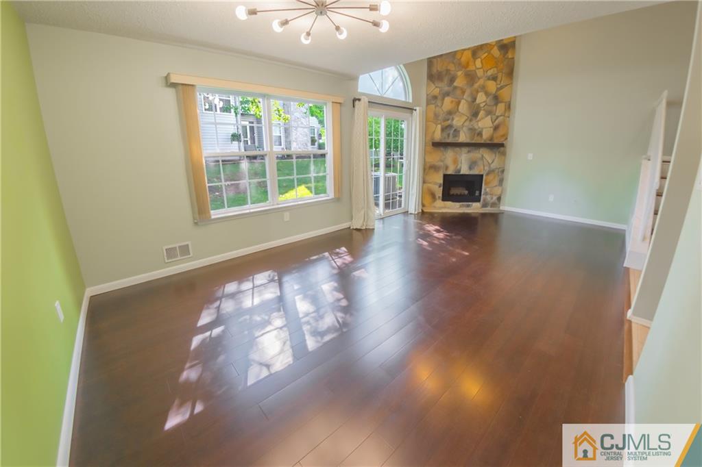 380 Draco Road Piscataway, NJ 08854 - Photo 16 of 35 a view of livingroom with furniture window and wooden floor