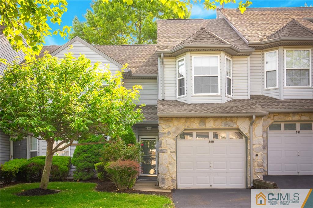 380 Draco Road Piscataway, NJ 08854 - Photo 2 of 35 a front view of a house with garden