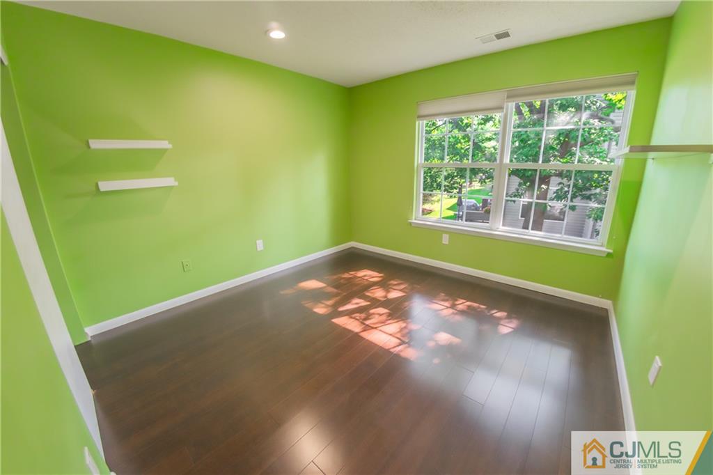 380 Draco Road Piscataway, NJ 08854 - Photo 21 of 35 a view of an empty room with a window