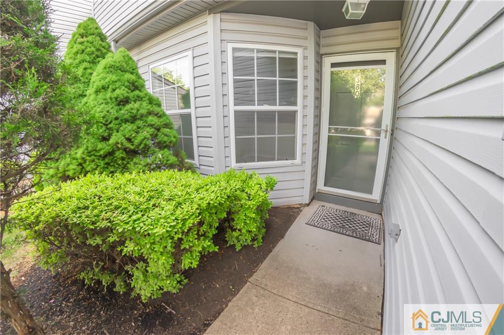 380 Draco Road Piscataway, NJ 08854 - Photo 3 of 35 a front view of a house with a yard