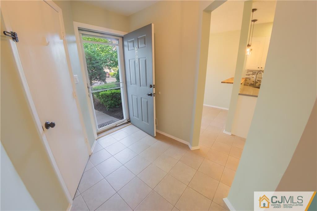 380 Draco Road Piscataway, NJ 08854 - Photo 4 of 35 a view of an empty room with a window