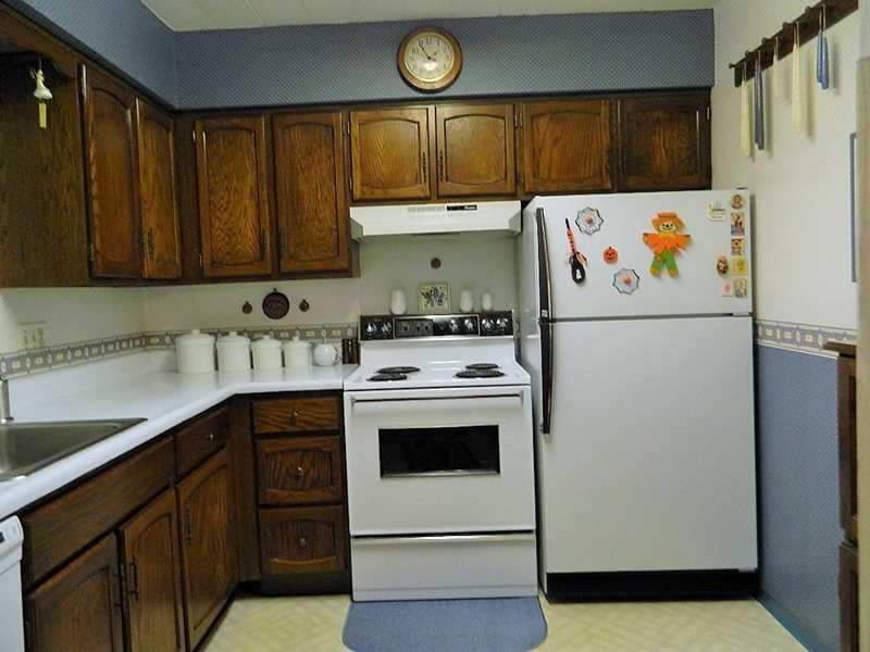 220 Coraopolis Road, Unit E8 Coraopolis, PA 15108 - Photo 4 of 17 Kitchen. Plenty of Cabinets and counter space in this fully equipped kitchen. Newer dishwasher & sink faucet in 2013. NHance Wood Renewal of Kitchen Cabinets in 2009.