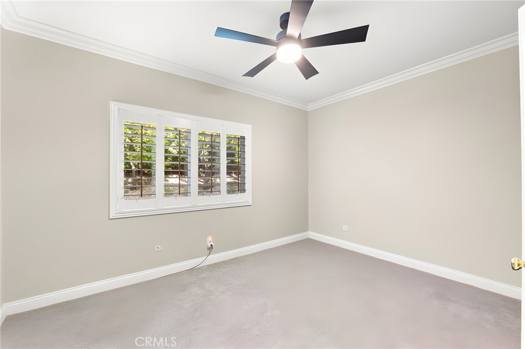 28561 Camelback Road Trabuco Canyon, CA 92679 - Photo 54 of 66 an empty room with a window and a fan