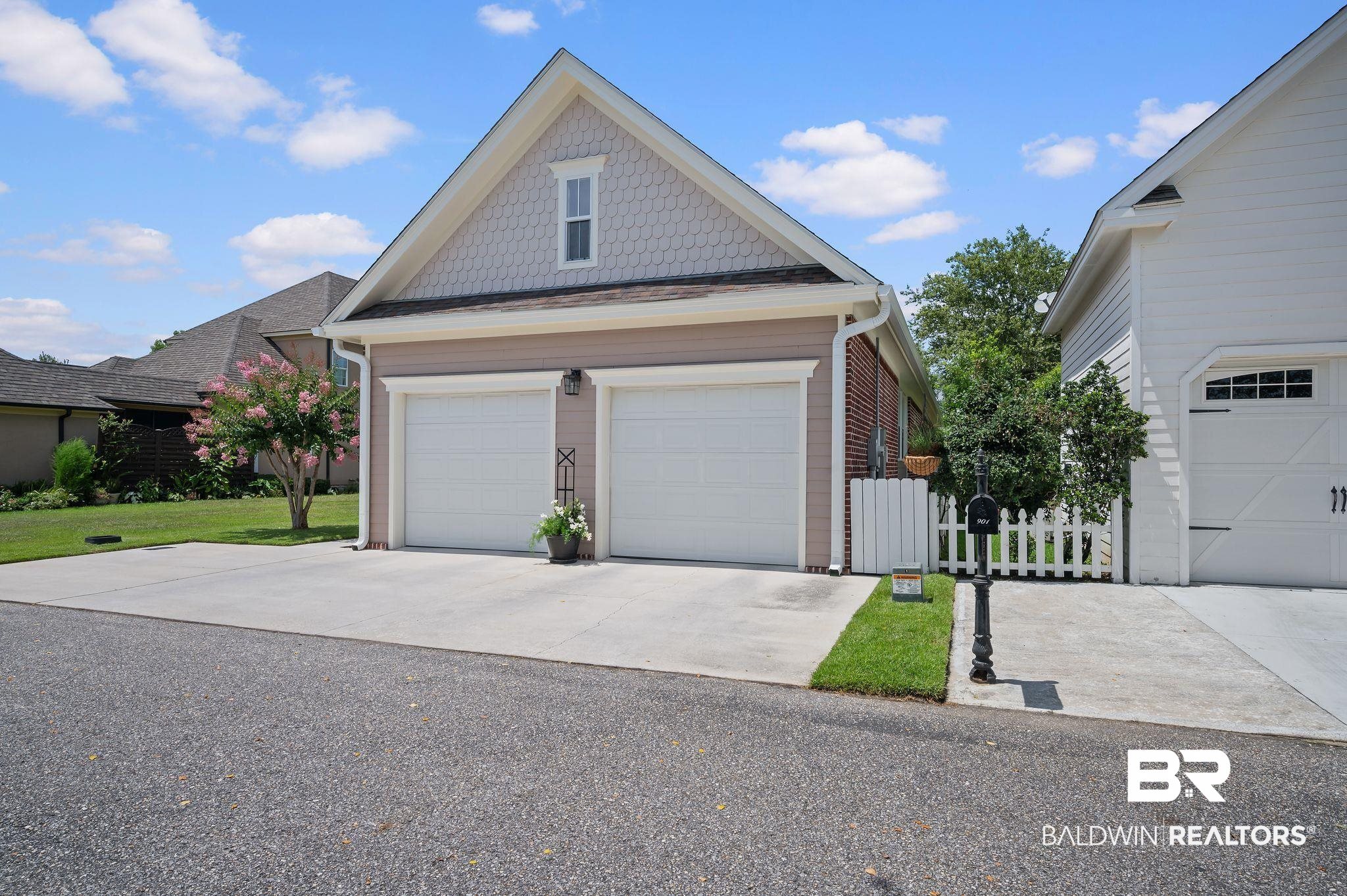 905 Buttercup Lane Foley, AL 36535 - Photo 11 of 47 View of front of property with a garage