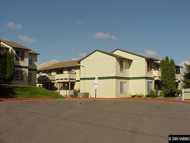 a view of a house with a street