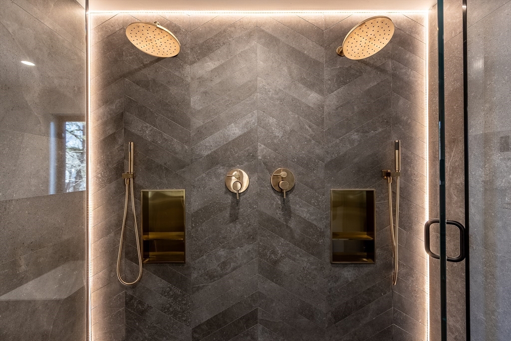 111 Albemarle Road Waltham, MA 02452 - Photo 17 of 32 a bathroom with a shower