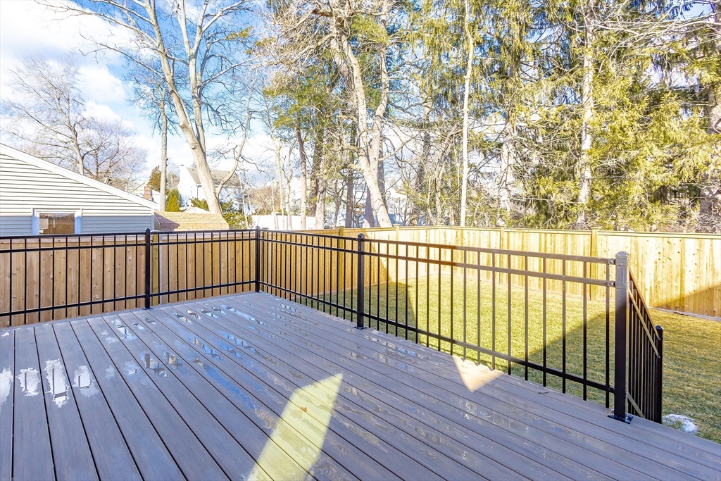 111 Albemarle Road Waltham, MA 02452 - Photo 30 of 32 a view of deck with wooden floor and fence