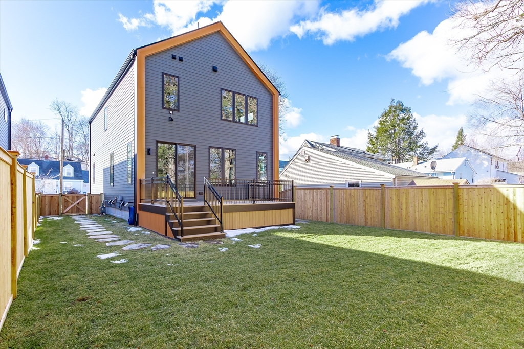 111 Albemarle Road Waltham, MA 02452 - Photo 31 of 32 a front view of a house with a yard