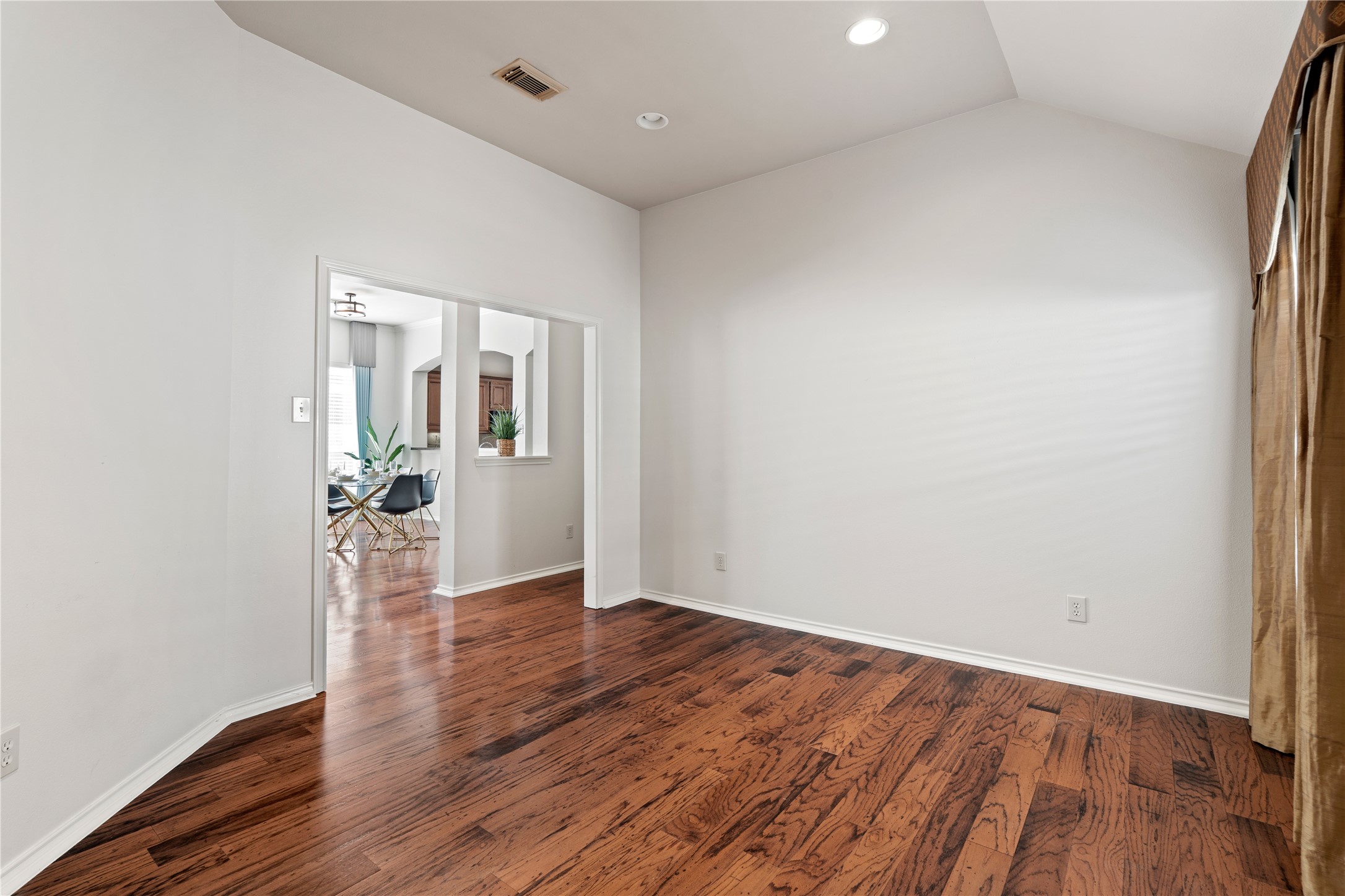 4323 Sunlit Pass Loop Humble, TX 77396 - Photo 13 of 30 wooden floor in an empty room
