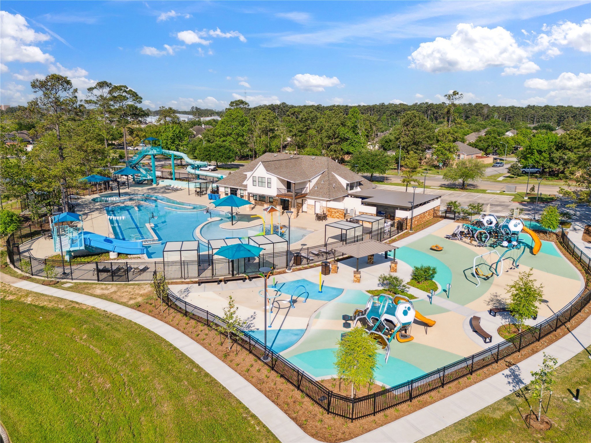 4323 Sunlit Pass Loop Humble, TX 77396 - Photo 26 of 30 a view of a swimming pool with a patio