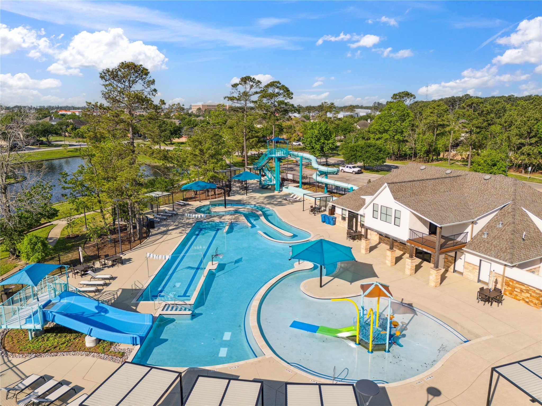 4323 Sunlit Pass Loop Humble, TX 77396 - Photo 27 of 30 a view of a swimming pool with outdoor seating
