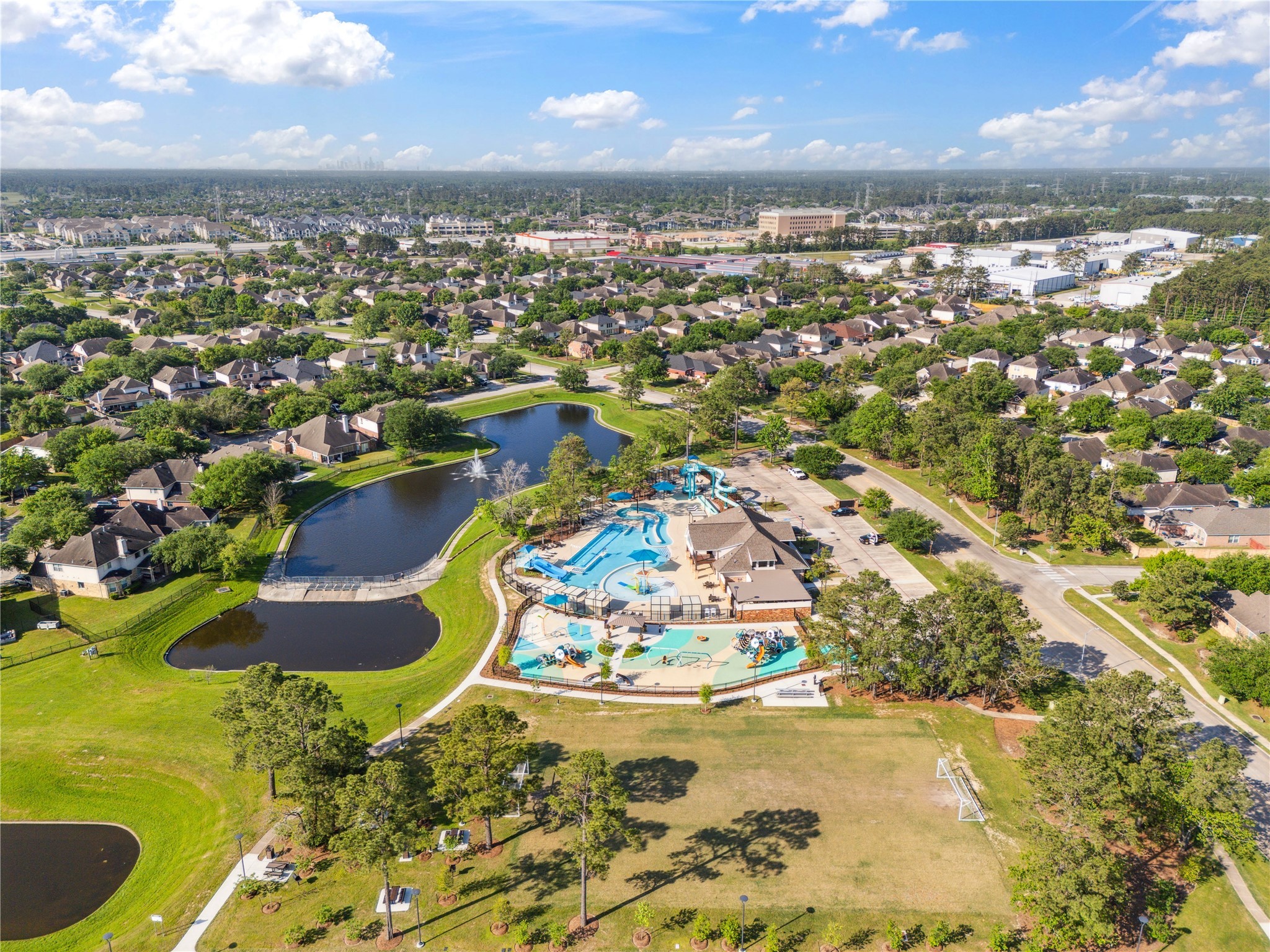 4323 Sunlit Pass Loop Humble, TX 77396 - Photo 28 of 30 an aerial view of residential houses with outdoor space