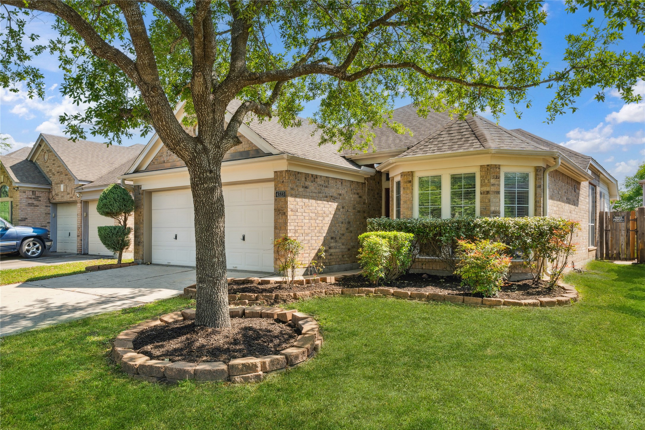 4323 Sunlit Pass Loop Humble, TX 77396 - Photo 29 of 30 a front view of a house with a yard