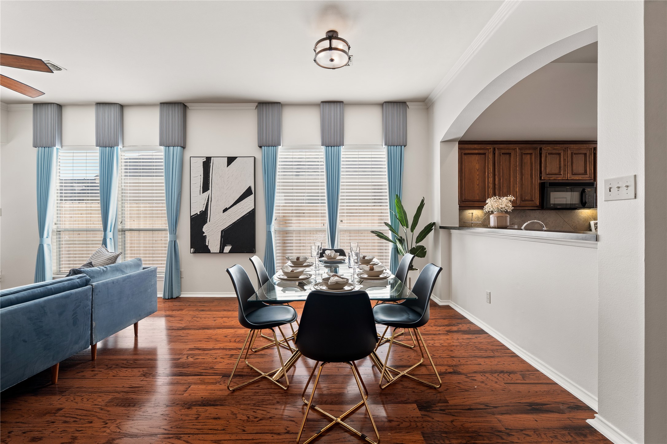 4323 Sunlit Pass Loop Humble, TX 77396 - Photo 7 of 30 a dining room with furniture and wooden floor