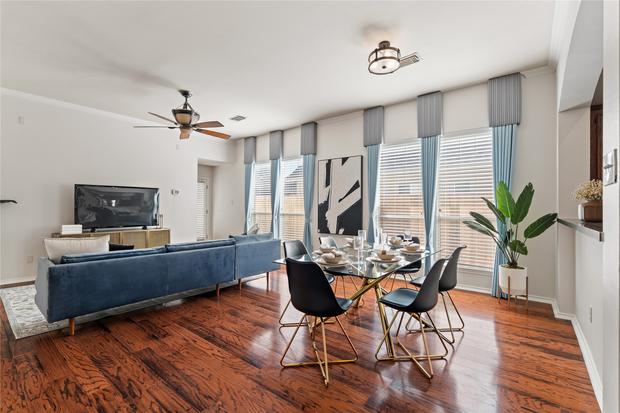 4323 Sunlit Pass Loop Humble, TX 77396 - Photo 30 of 30 a view of a livingroom with furniture and a flat screen tv