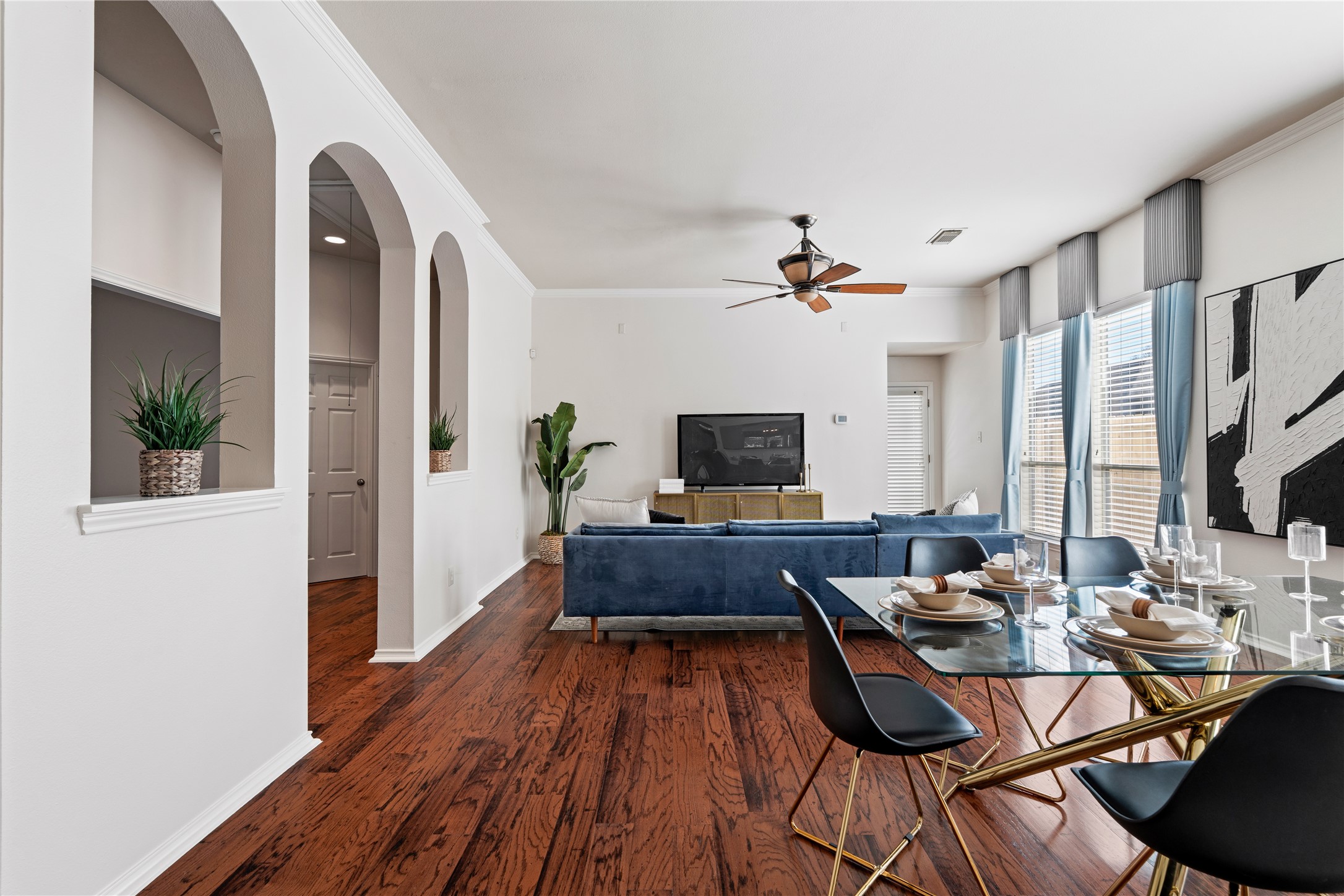 4323 Sunlit Pass Loop Humble, TX 77396 - Photo 9 of 30 a view of a livingroom with furniture and a flat screen tv