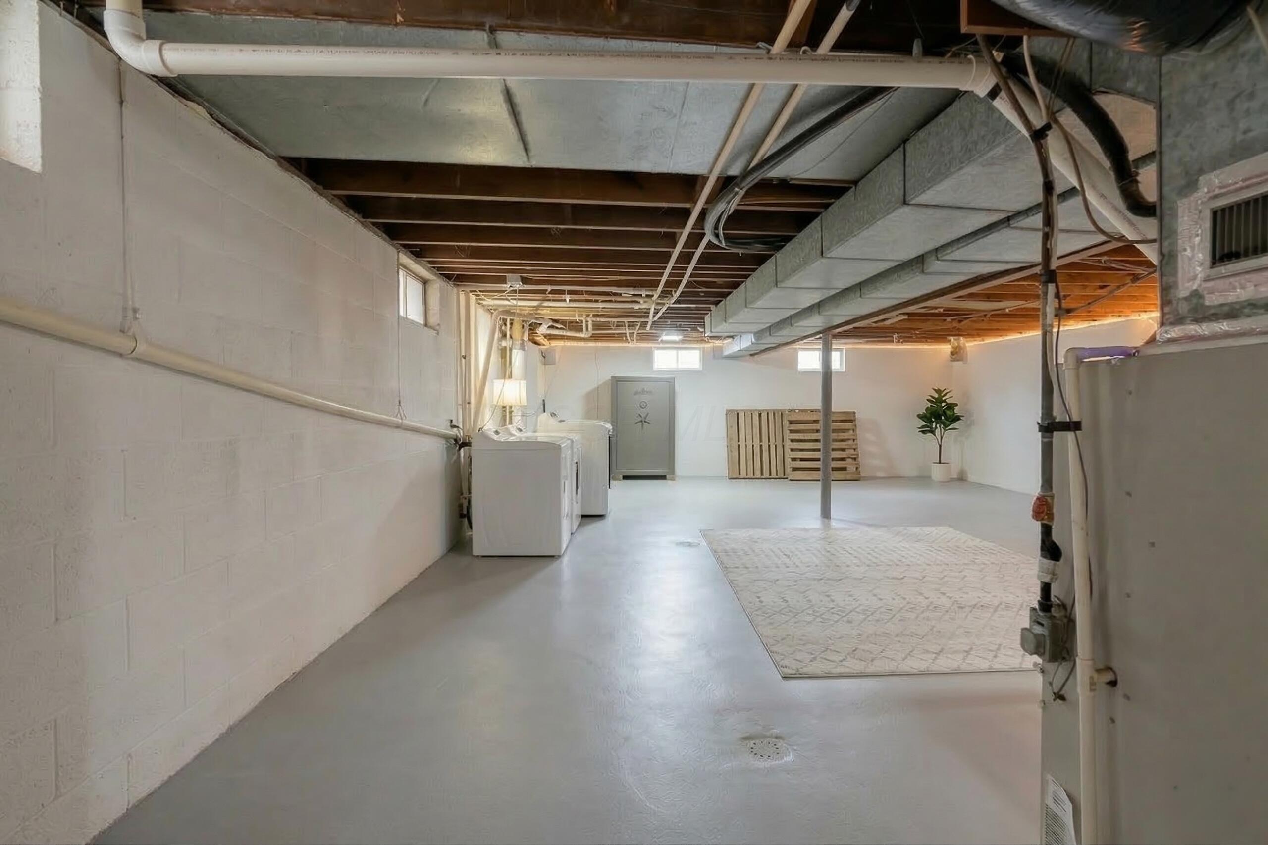 4021 Baker Road Albany, OH 45710 - Photo 16 of 22 Basement space minus some stuff