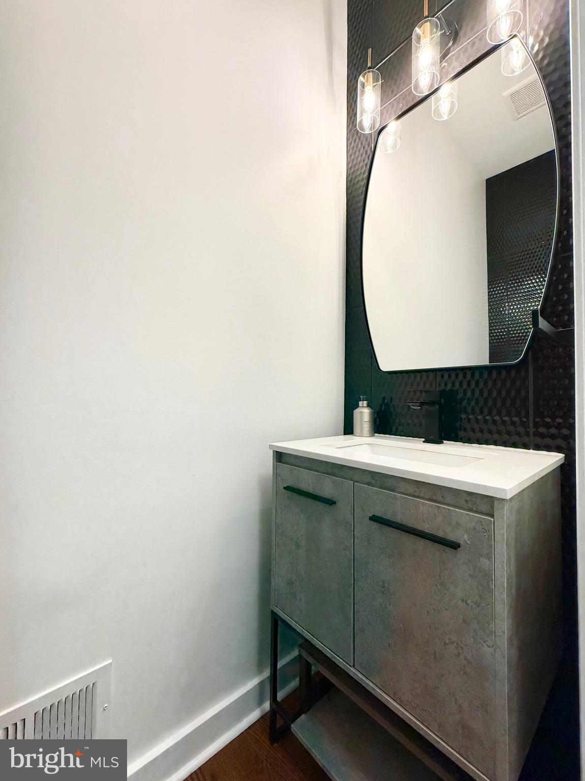 308 Roarks Trail Warminster, PA 18974 - Photo 21 of 68 a bathroom with a sink and mirror