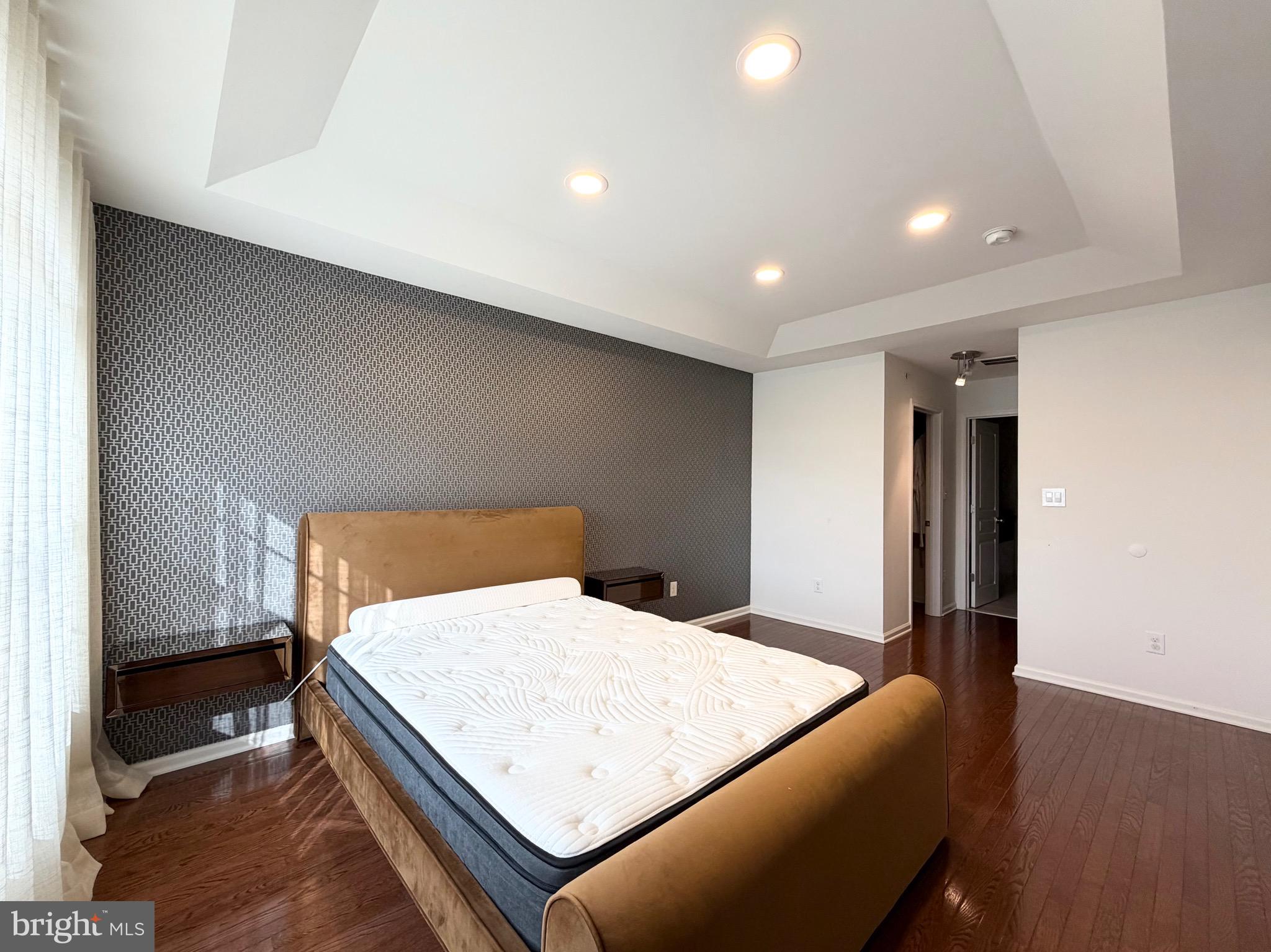 308 Roarks Trail Warminster, PA 18974 - Photo 31 of 68 a room with a bed and a wooden floor