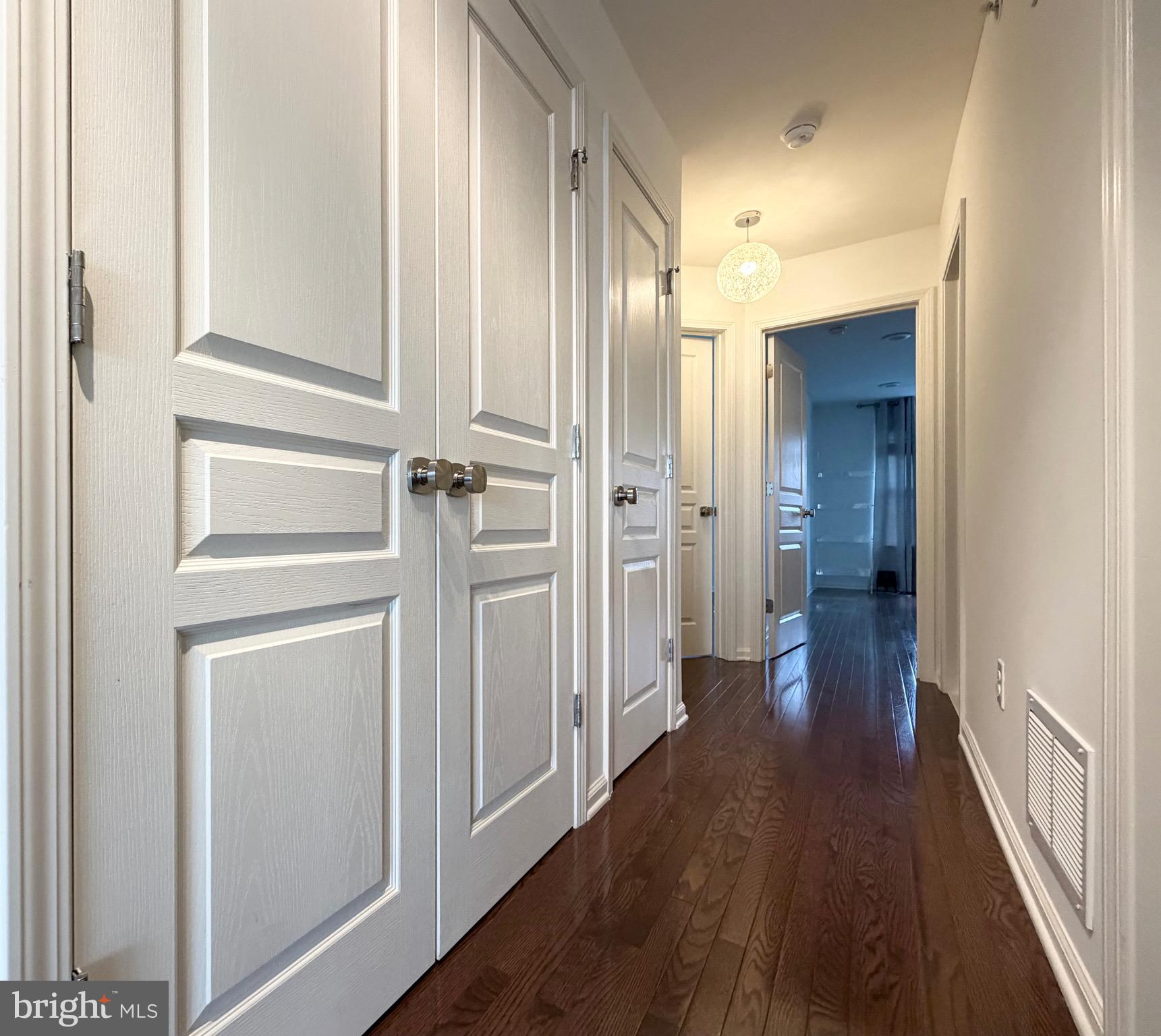 308 Roarks Trail Warminster, PA 18974 - Photo 44 of 68 a view of a hallway with wooden floor