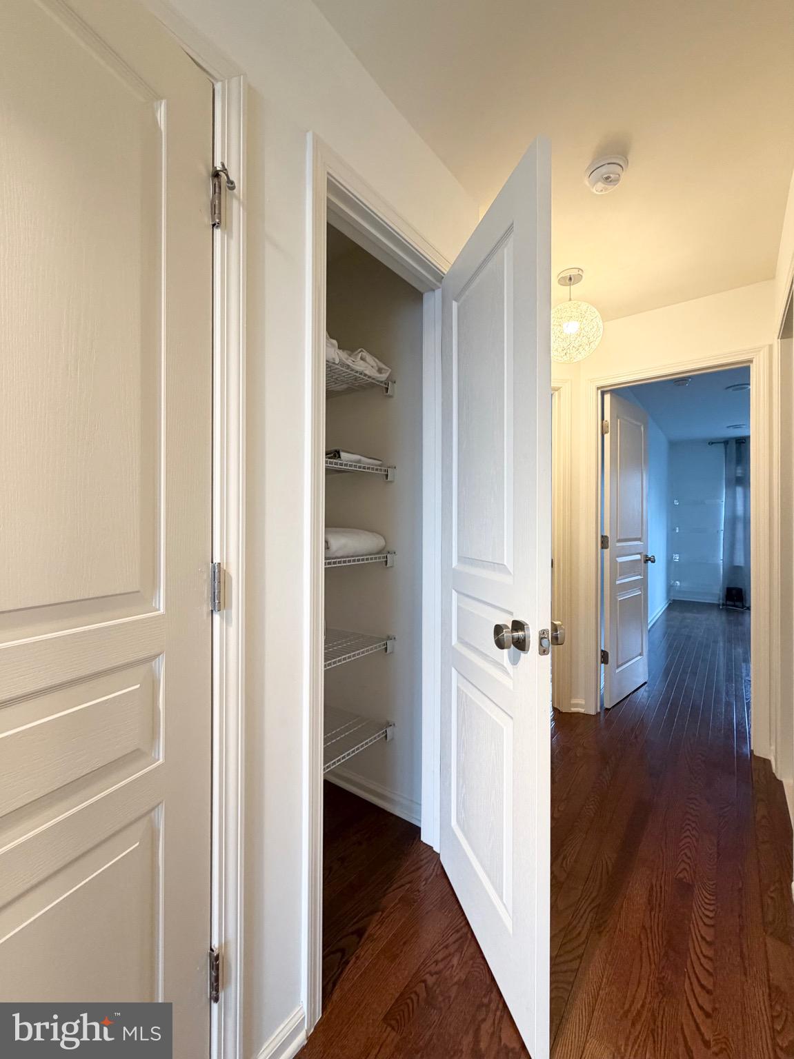 308 Roarks Trail Warminster, PA 18974 - Photo 47 of 68 a view of a hallway with wooden floor