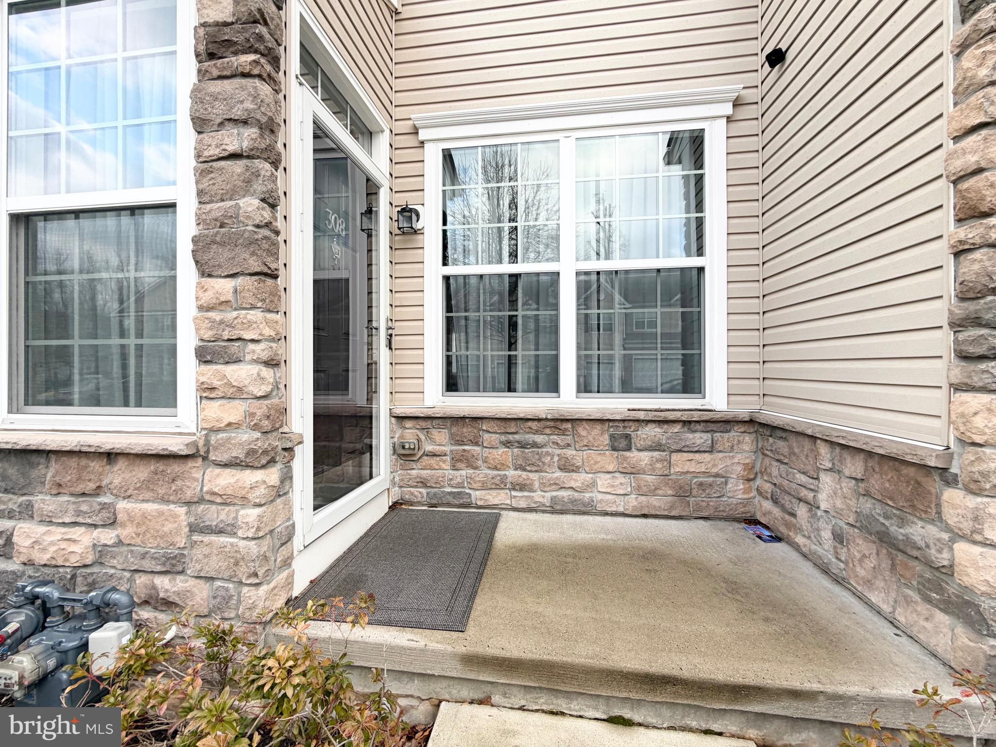 308 Roarks Trail Warminster, PA 18974 - Photo 5 of 68 a view of a door of a house with a window