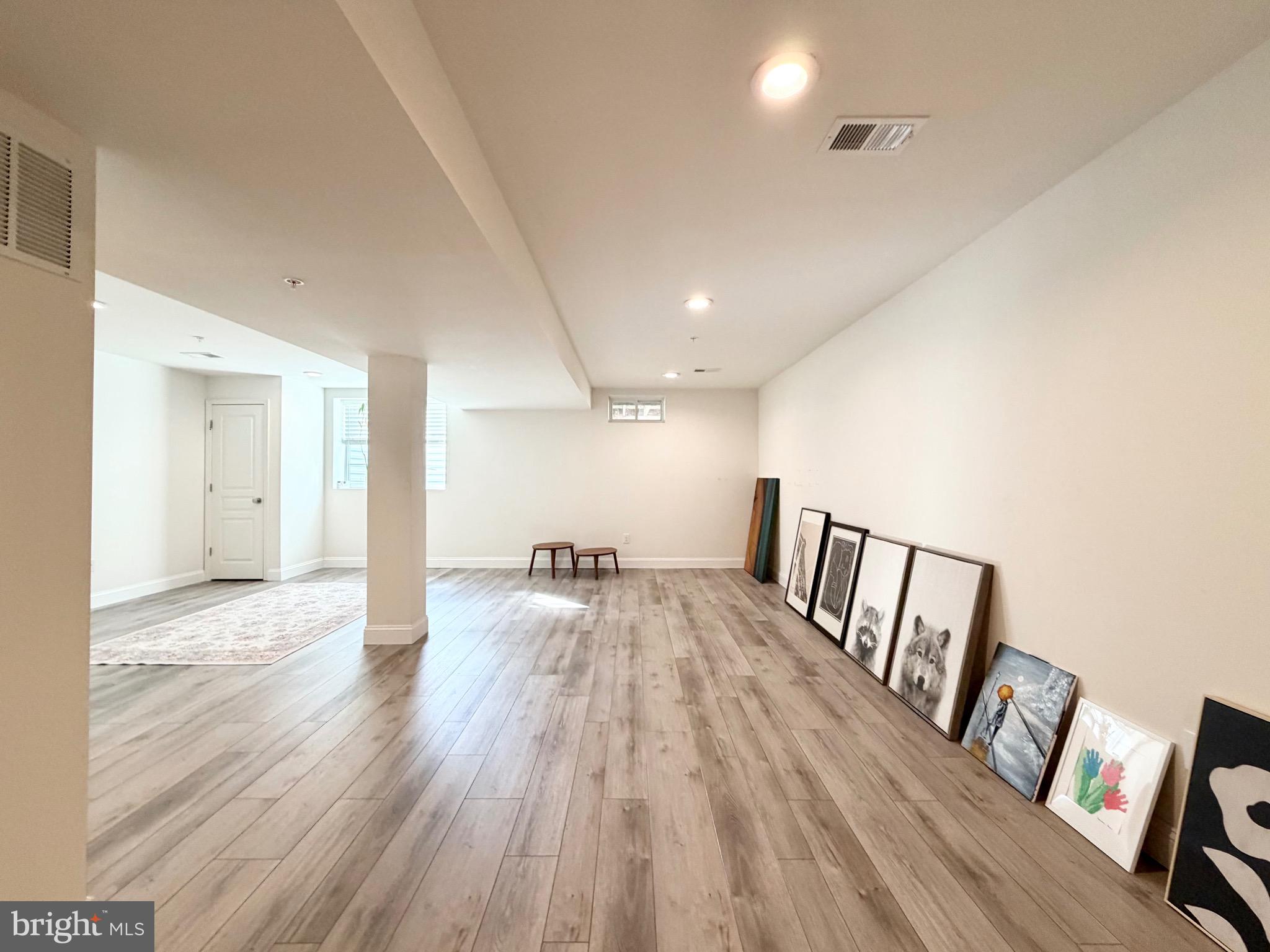 308 Roarks Trail Warminster, PA 18974 - Photo 66 of 68 a view of a livingroom with wooden floor and staircase