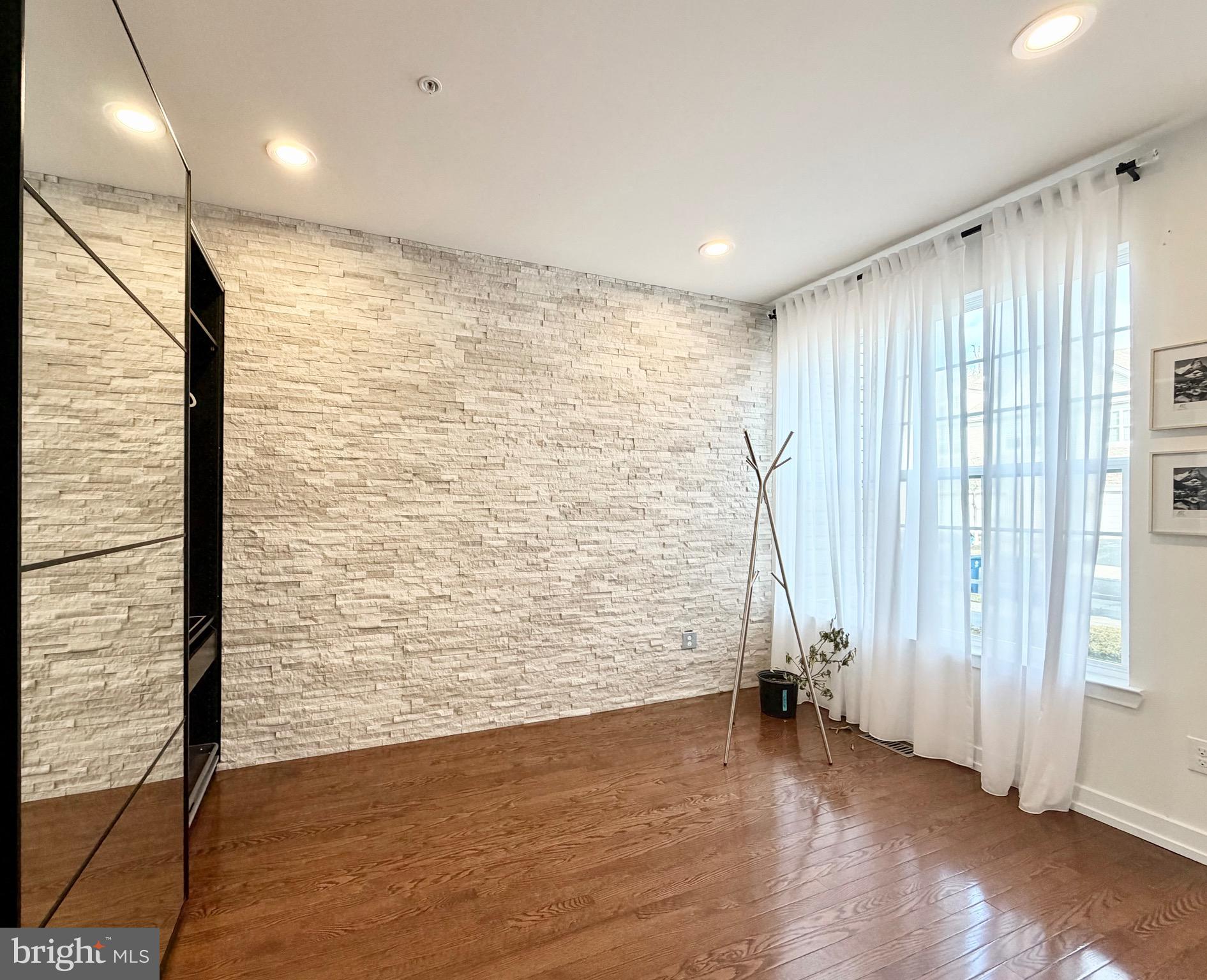 308 Roarks Trail Warminster, PA 18974 - Photo 8 of 68 a view of empty room with wooden floor and fan