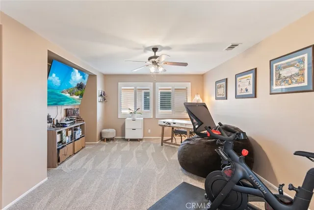 a bathroom with a sink vanity and a mirror
