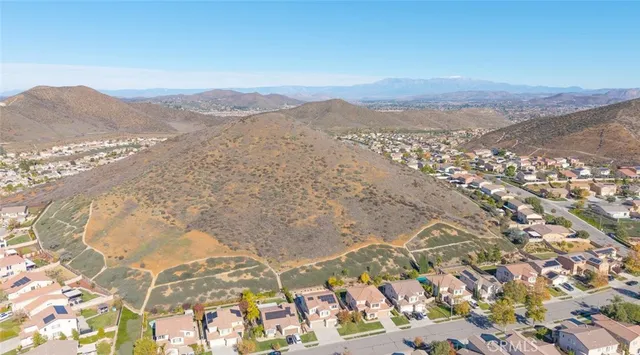an aerial view of a swimming pool and outdoor space