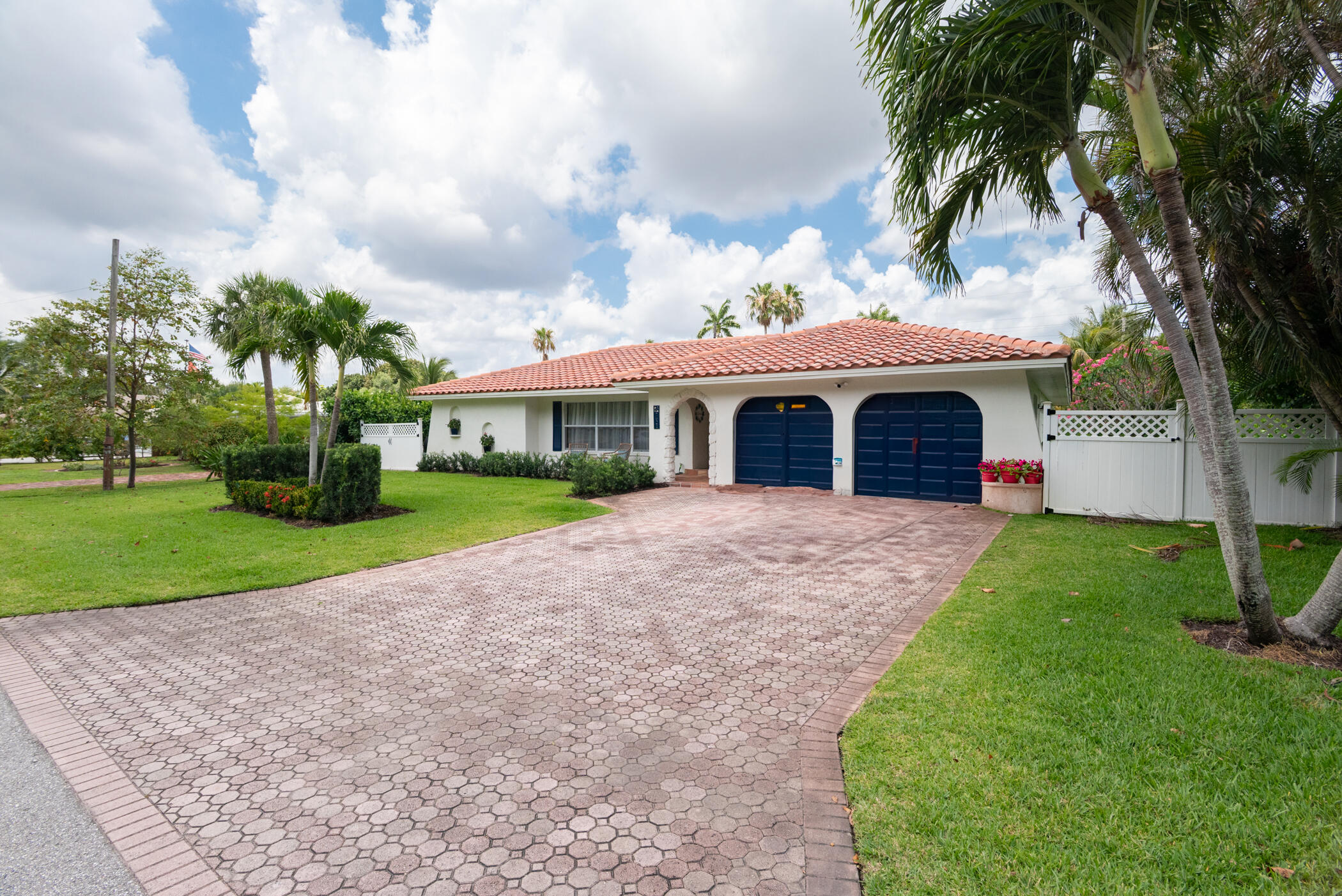 7621 West Lake Drive Lake Clarke Shores, FL 33406 - Photo 1 of 28 a view of outdoor space yard and house