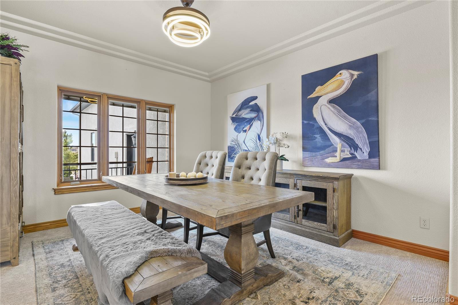 5220 Roundup Ridge Road Colorado Springs, CO 80908 - Photo 12 of 50 a view of a dining room with furniture