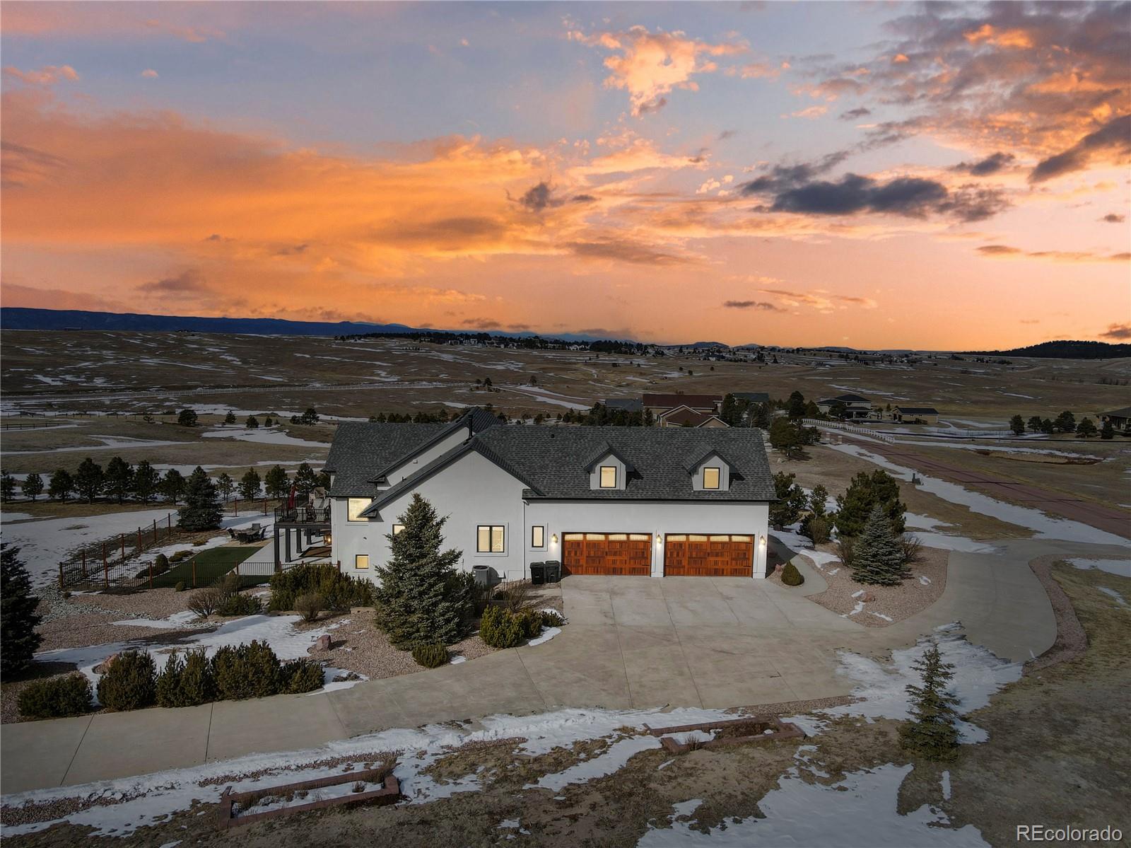 5220 Roundup Ridge Road Colorado Springs, CO 80908 - Photo 2 of 50 a view of a terrace with wooden fence