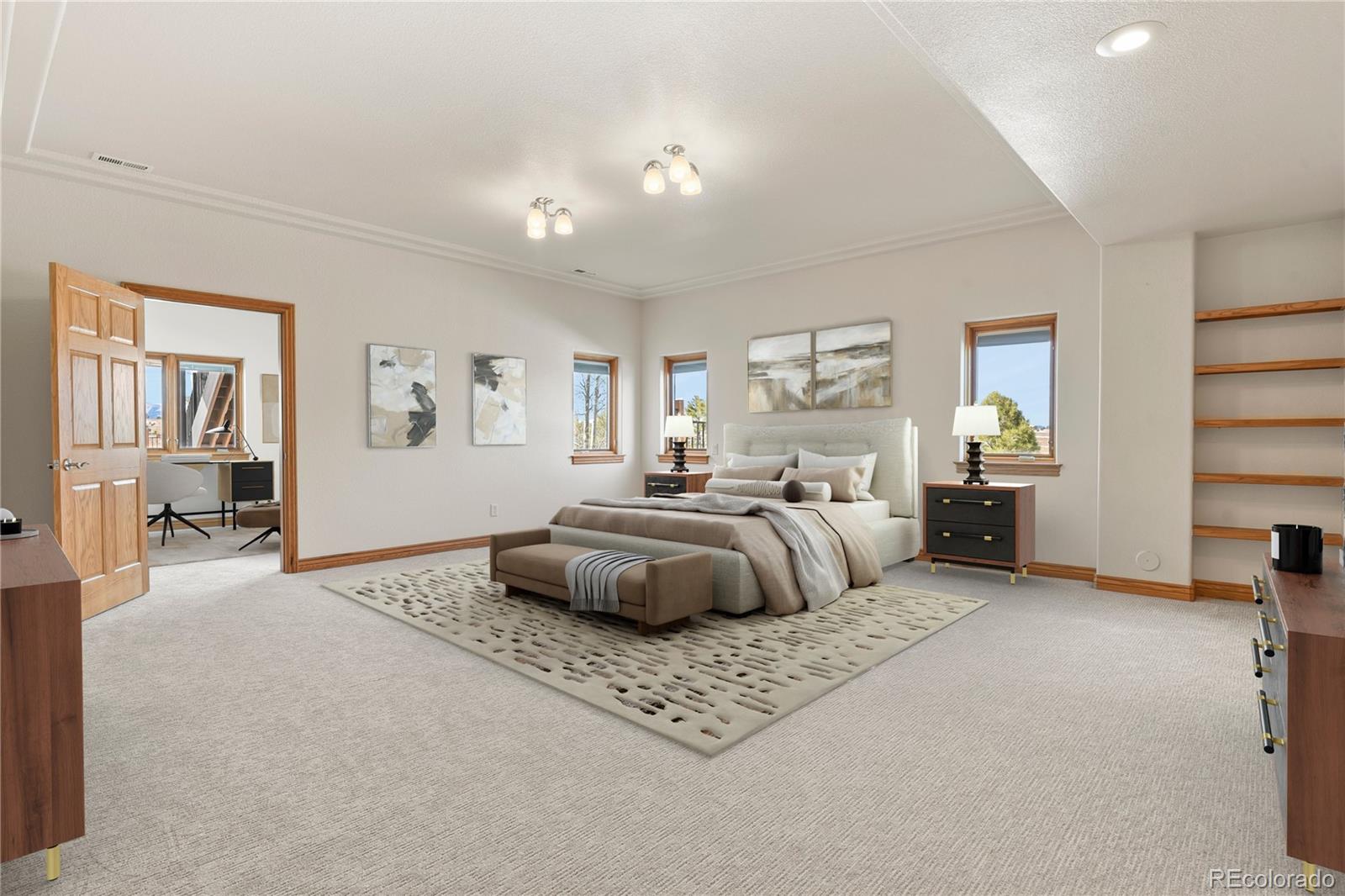 5220 Roundup Ridge Road Colorado Springs, CO 80908 - Photo 27 of 50 a bedroom with a bed and window
