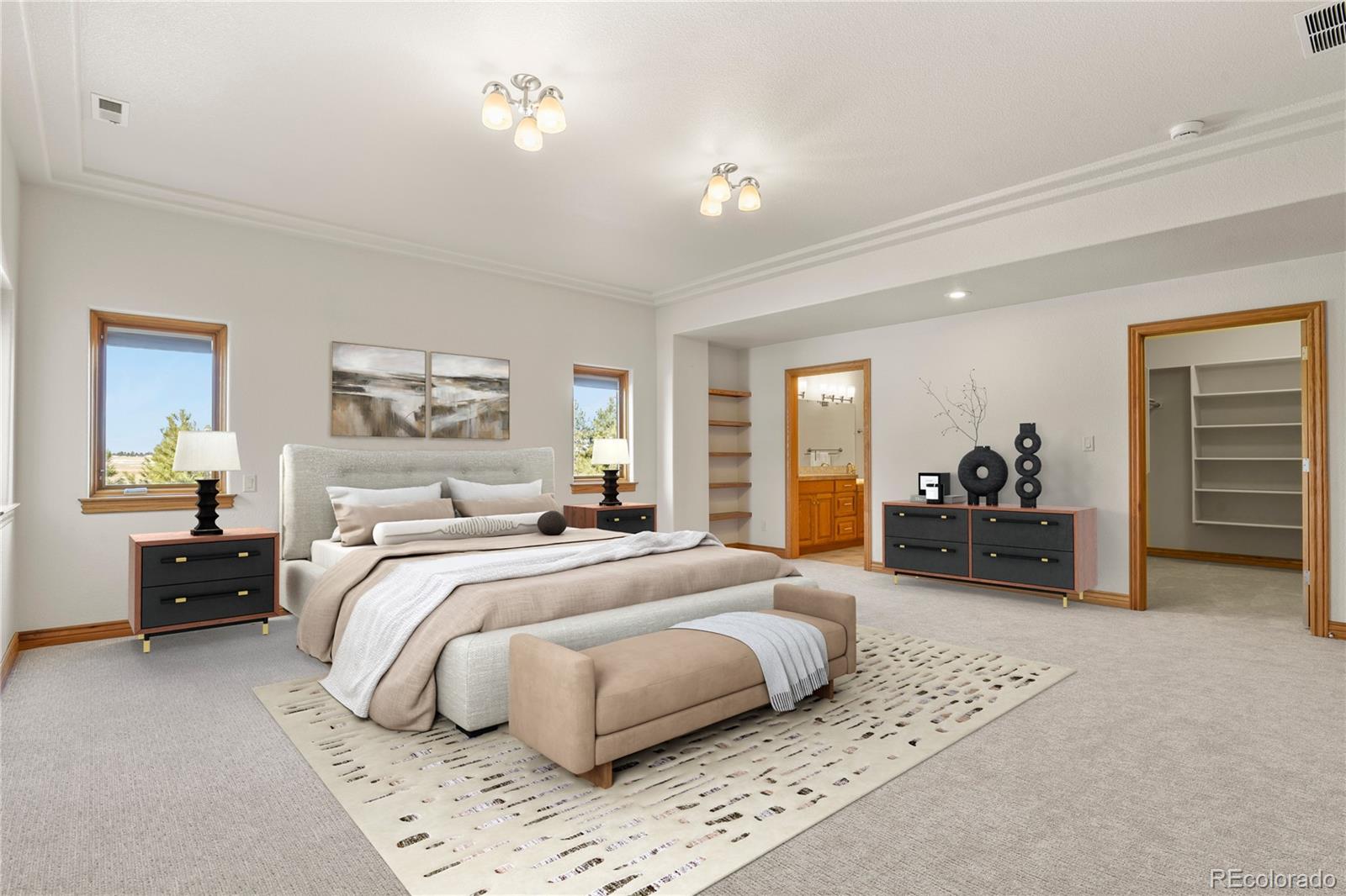 5220 Roundup Ridge Road Colorado Springs, CO 80908 - Photo 28 of 50 a bedroom with a bed and a couch