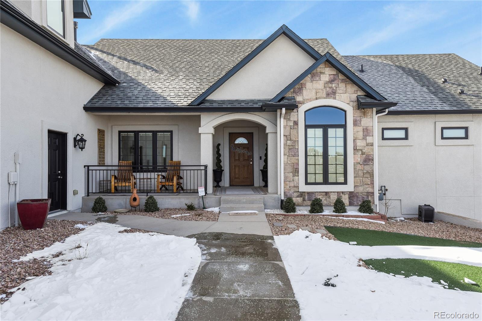 5220 Roundup Ridge Road Colorado Springs, CO 80908 - Photo 4 of 50 a view of a house with outdoor space
