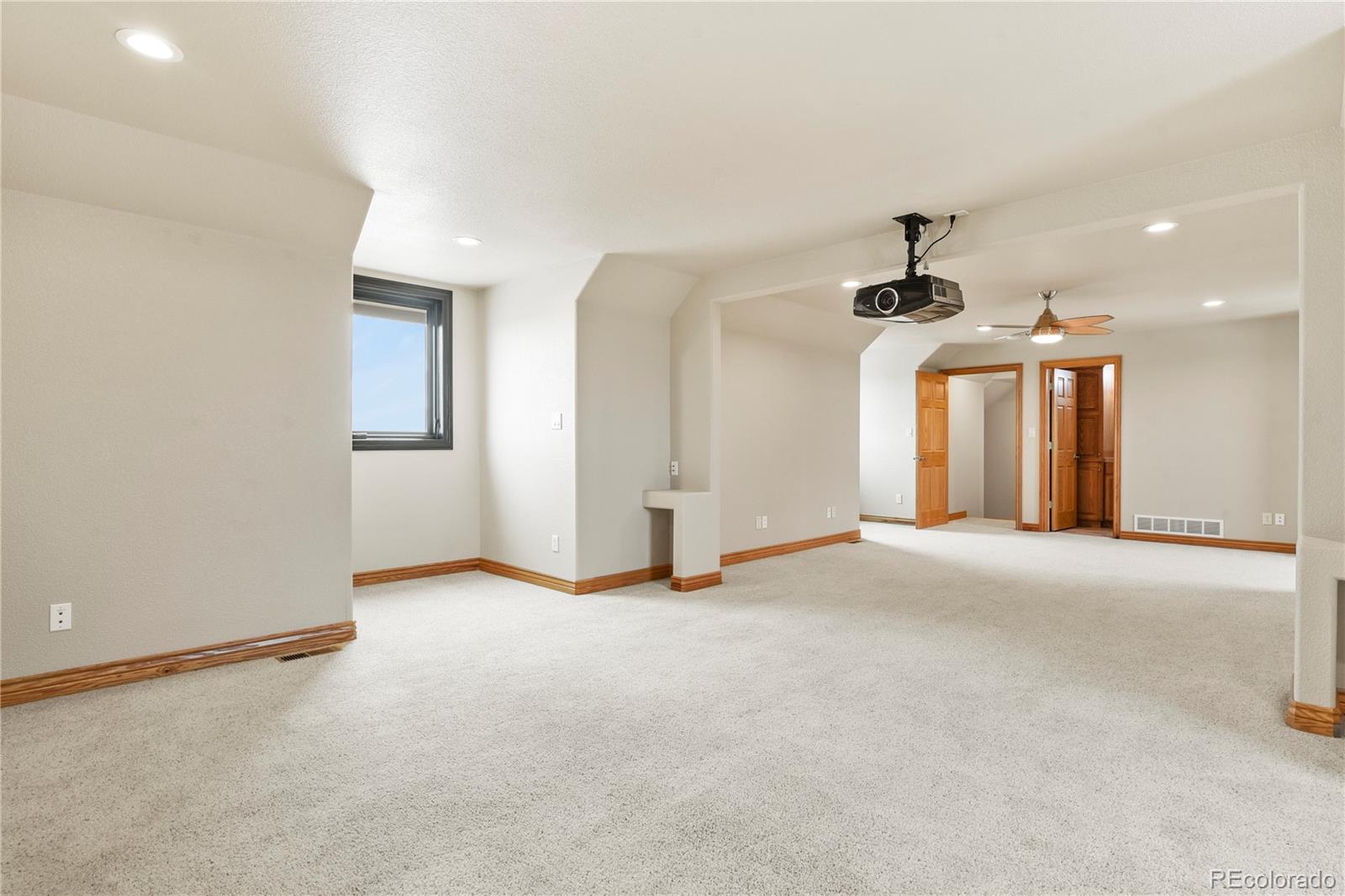 5220 Roundup Ridge Road Colorado Springs, CO 80908 - Photo 44 of 50 a view of a livingroom and a ceiling fan